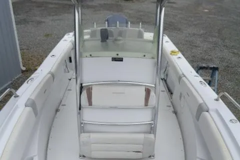 Slide: The Image of 2008 Triumph 235 CC boat interior with seating and console. - 20