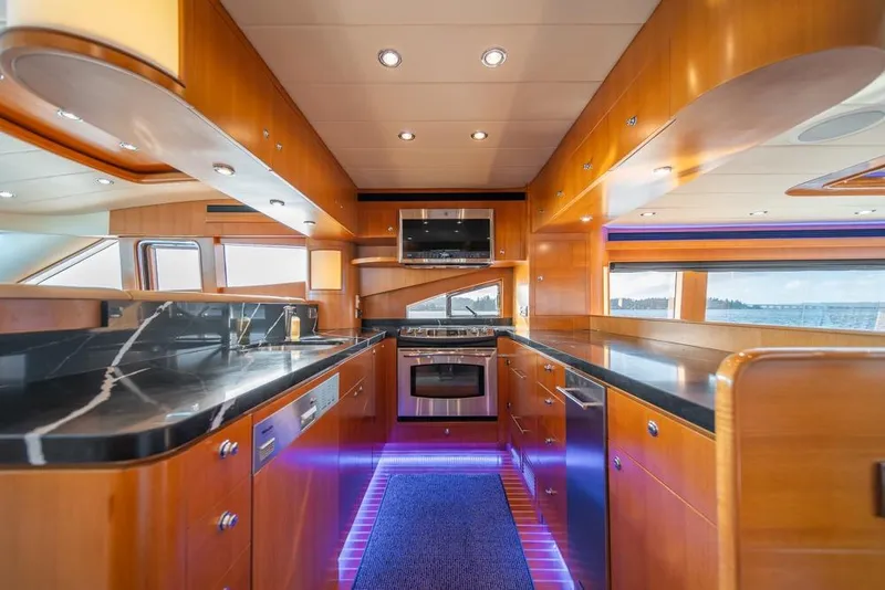Slide: The Image of Luxurious kitchen interior of 2009 Horizon 73 yacht with modern appliances and sleek design. - 17