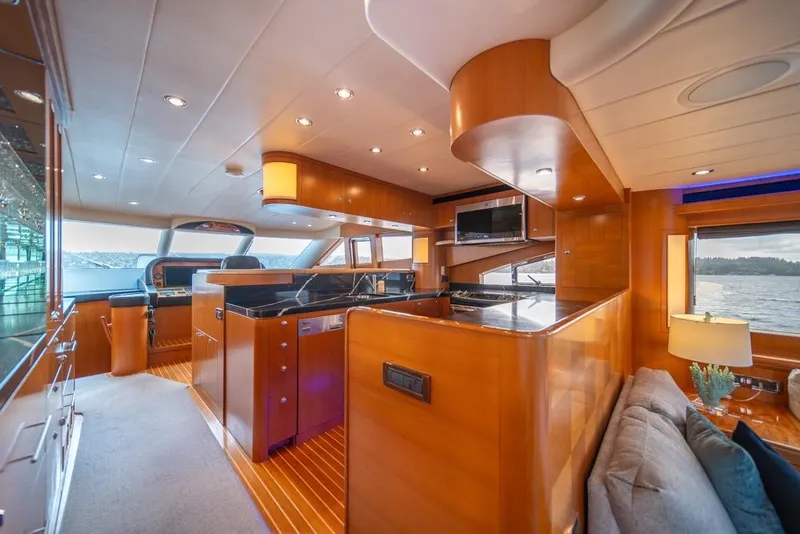 Slide: The Image of Luxurious interior of 2009 Horizon 73 yacht with modern kitchen and scenic views. - 19