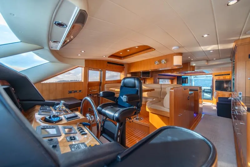 Slide: The Image of Luxurious interior of 2009 Horizon 73 yacht with modern helm and seating area. - 20