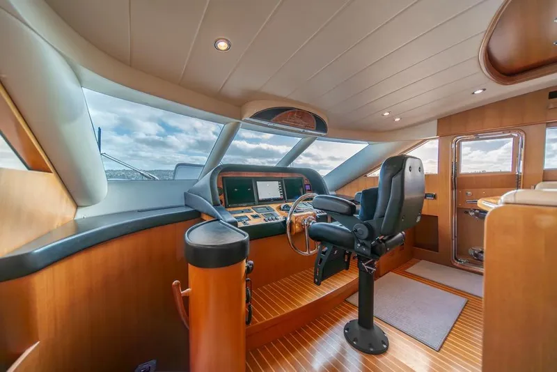 Slide: The Image of Luxurious 2009 Horizon 73 yacht helm with modern controls and panoramic windows. - 22
