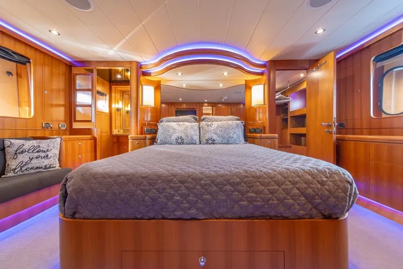 Slide: The Image of Luxurious cabin interior of 2009 Horizon 73 yacht with elegant lighting and cozy bedding. - 33