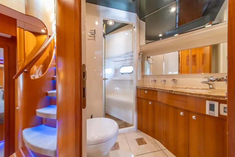 Slide: The Image of Luxurious bathroom interior on 2009 Horizon 73 yacht with wooden cabinetry and modern fixtures. - 36