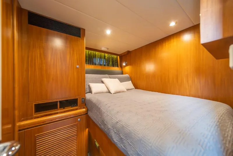 Slide: The Image of Luxurious wooden cabin interior with cozy bed, Horizon 73 yacht, 2009 model. - 40