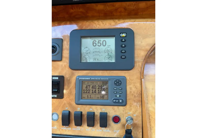 Slide: The Image of Boat control panel with navigation and engine displays, Horizon 73, 2009 model. - 66