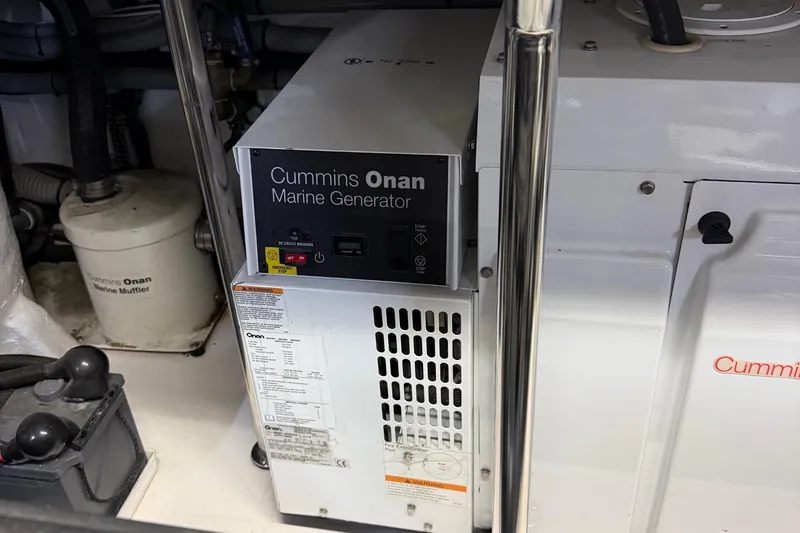 Slide: The Image of Cummins Onan marine generator in 2009 Horizon 73 yacht engine room. - 72