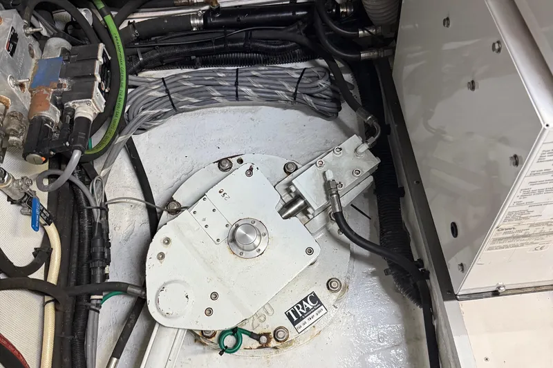 Slide: The Image of Engine room of 2009 Horizon 73 yacht with mechanical components and wiring. - 75