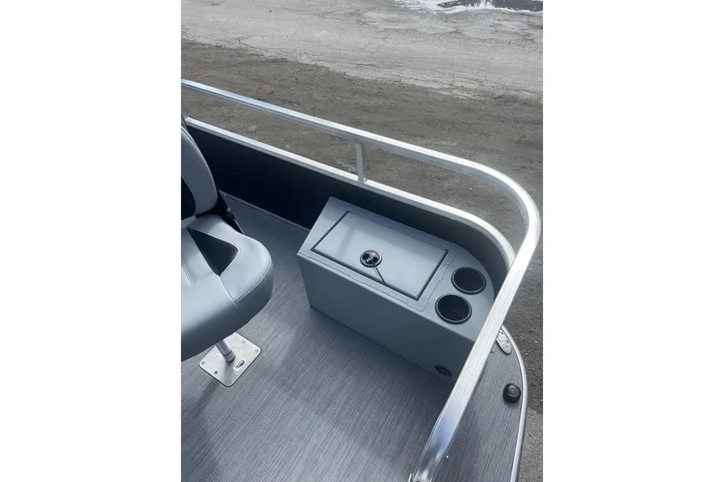 Slide: The Image of 2024 Lowe Ultra 162 Fish & Cruise boat interior with seating and storage. - 8