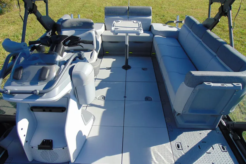 Slide: The Image of 2023 Sea-Doo Switch Cruise 21 interior with spacious seating and modern controls. - 12
