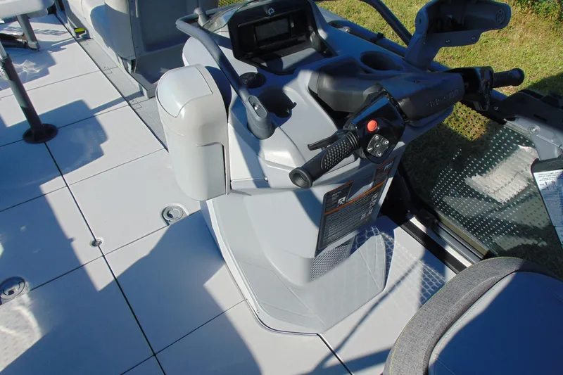 Slide: The Image of 2023 Sea-Doo Switch Cruise 21 cockpit with steering controls and seating area. - 14