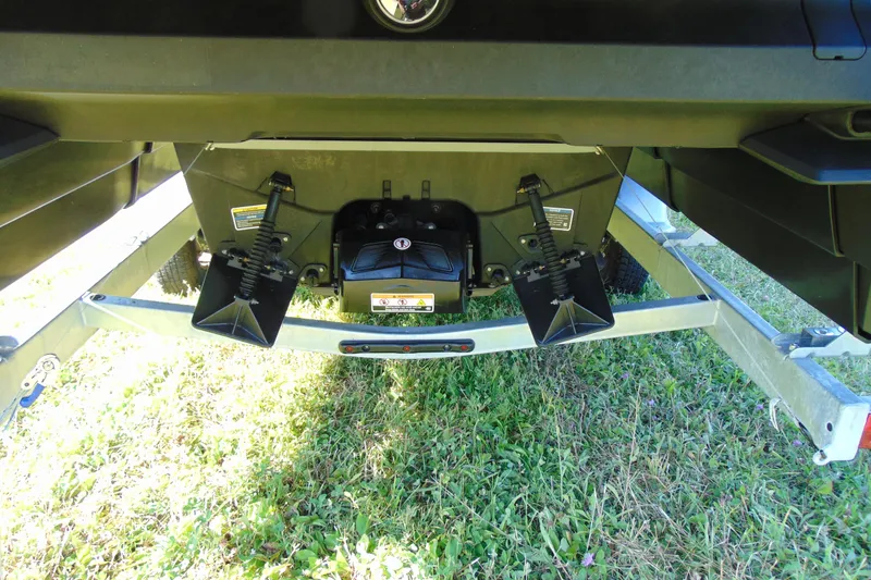 Slide: The Image of 2023 Sea-Doo Switch Cruise 21 trailer view on grass, showcasing undercarriage details. - 5