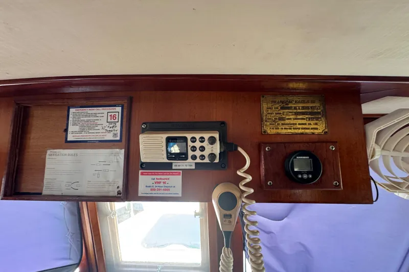Slide: The Image of Interior of 1987 Transpacific Marine Eagle 32 with navigation equipment and radio. - 24
