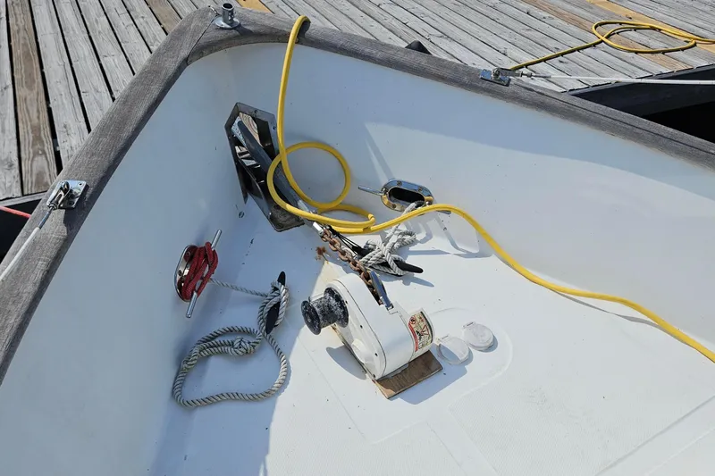 Slide: The Image of 1987 Transpacific Marine Eagle 32 boat deck with ropes and equipment. - 32