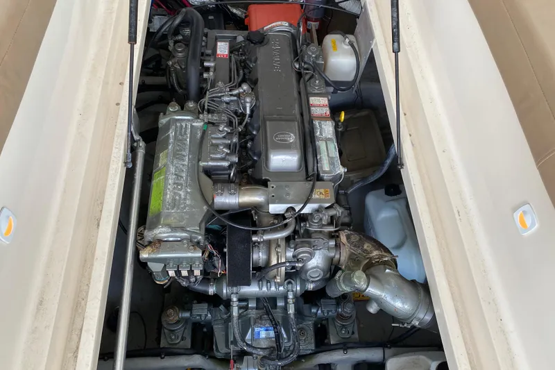 Slide: The Image of Flat-screen TV inside 2003 Mainship Pilot 30-II Sedan boat cabin. - 32