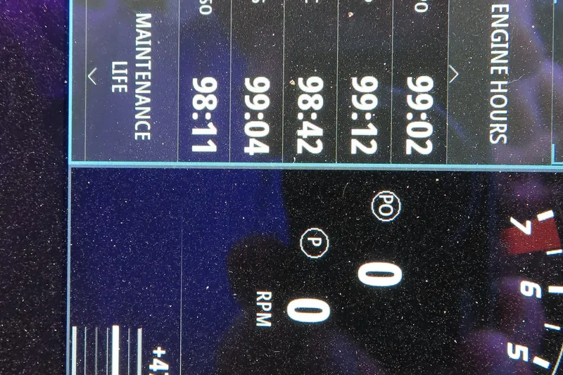 Slide: The Image of Close-up of MTI 50v 2024 dashboard displaying engine hours and maintenance life. - 18