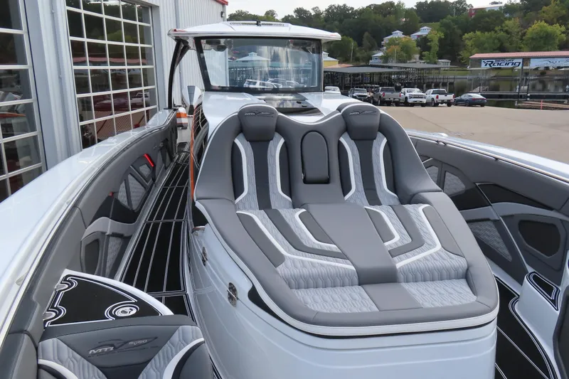 Slide: The Image of 2024 MTI 50v luxury boat with sleek design and comfortable seating. - 21
