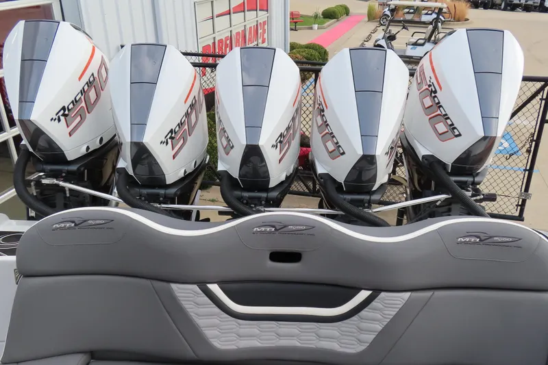 Slide: The Image of Four MTI 50v 2024 racing boat engines, showcasing power and performance. - 9