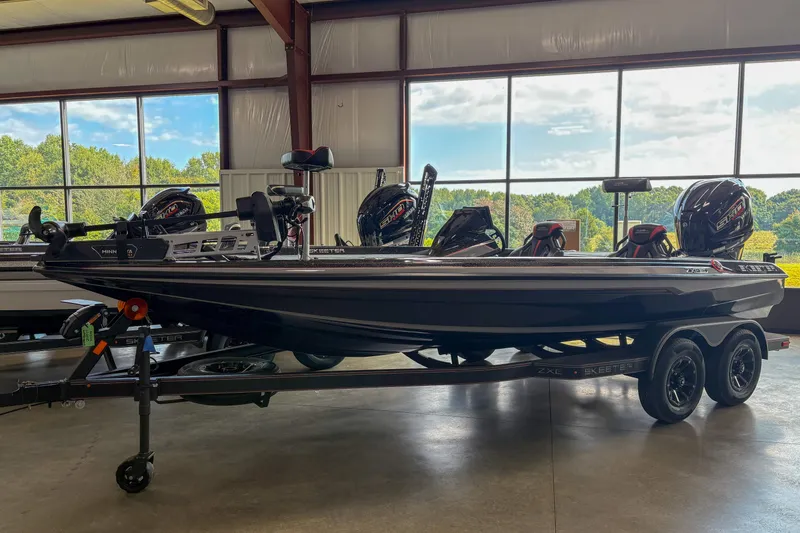 The Image of 2026 Skeeter ZXE20 boat in showroom, featuring dual engines and sleek design. - 1