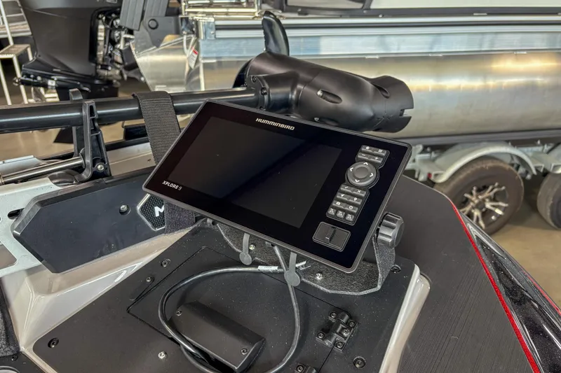 Slide: The Image of 2026 Skeeter ZXE20 boat with Humminbird Xplore 9 navigation system. - 5
