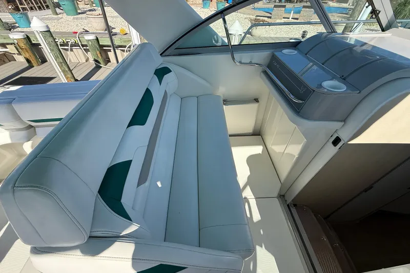 Slide: The Image of 1998 Formula 34 Performance Cruiser interior with white seating and dashboard. - 17