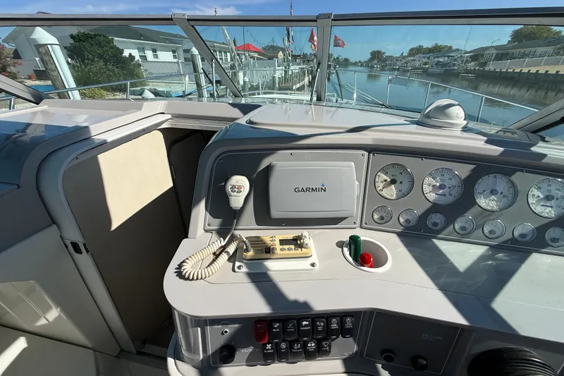 Slide: The Image of 1998 Formula 34 Performance Cruiser helm with Garmin navigation and control panel. - 20