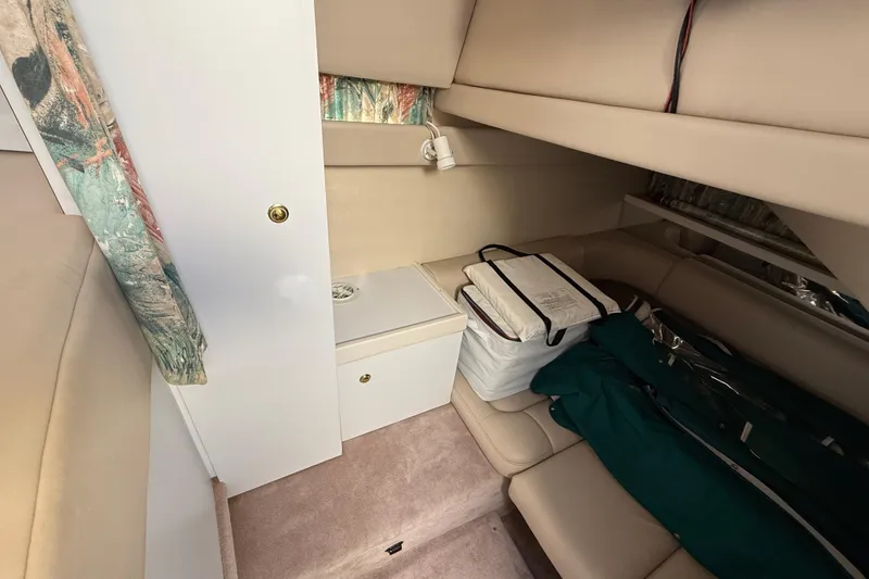 Slide: The Image of Interior cabin of 1998 Formula 34 Performance Cruiser with storage and seating. - 29