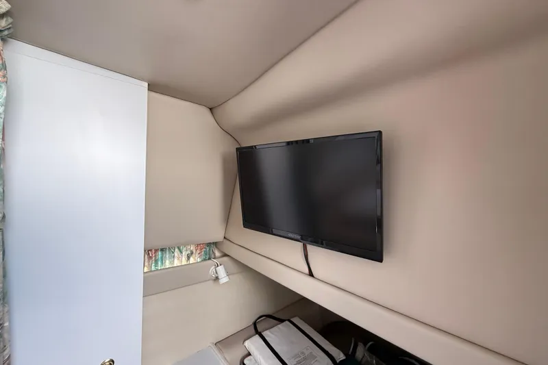 Slide: The Image of Interior of 1998 Formula 34 Performance Cruiser with mounted flat-screen TV. - 30