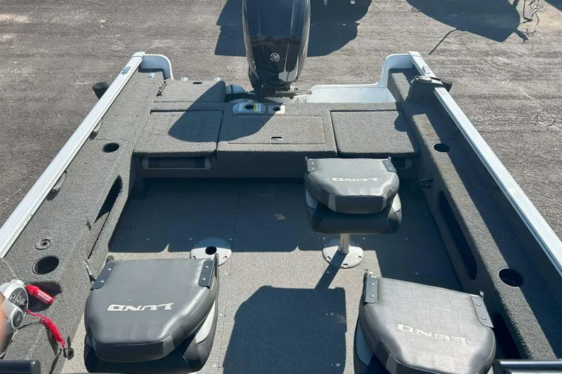 Slide: The Image of 2023 Lund 1775 Adventure Sport boat interior with seating and storage compartments. - 1