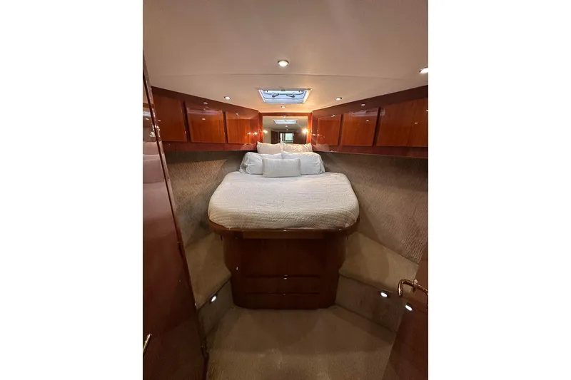 Slide: The Image of Luxurious cabin interior of 2006 Egg Harbor 43 Sport Yacht with elegant wood finishes. - 10