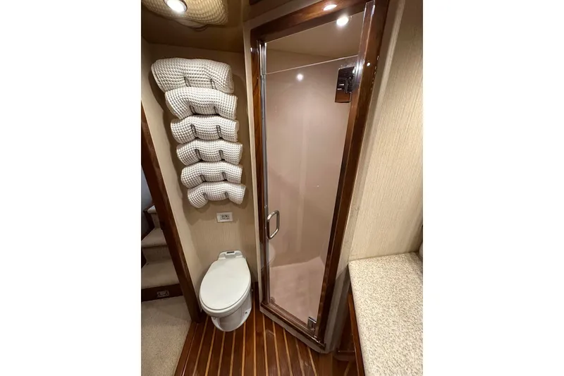 Slide: The Image of Bathroom interior of 2006 Egg Harbor 43 Sport Yacht with shower and toilet. - 13