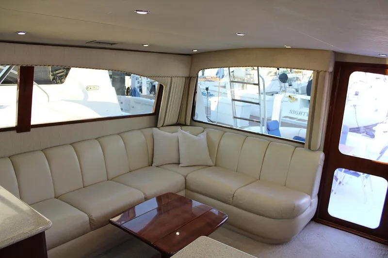Slide: The Image of Luxurious interior of 2006 Egg Harbor 43 Sport Yacht with cream leather seating. - 4