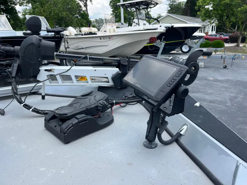 Slide: The Image of 2022 Vexus AVX189 boat with advanced navigation system and control panel. - 8