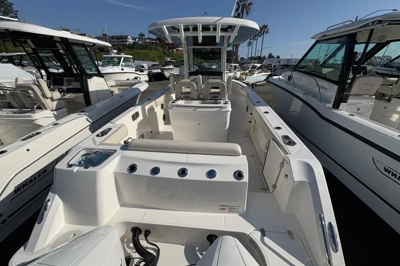 Slide: The Image of 2026 Boston Whaler 280 Outrage boat interior, featuring spacious seating and modern design. - 3