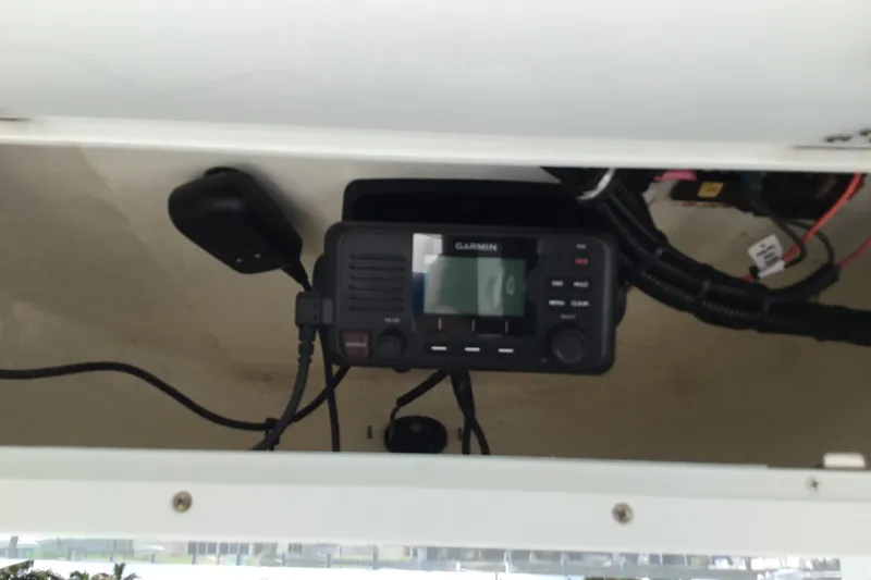 Slide: The Image of Garmin marine radio installed on a 2020 Sea Hunt Ultra 225 boat. - 27