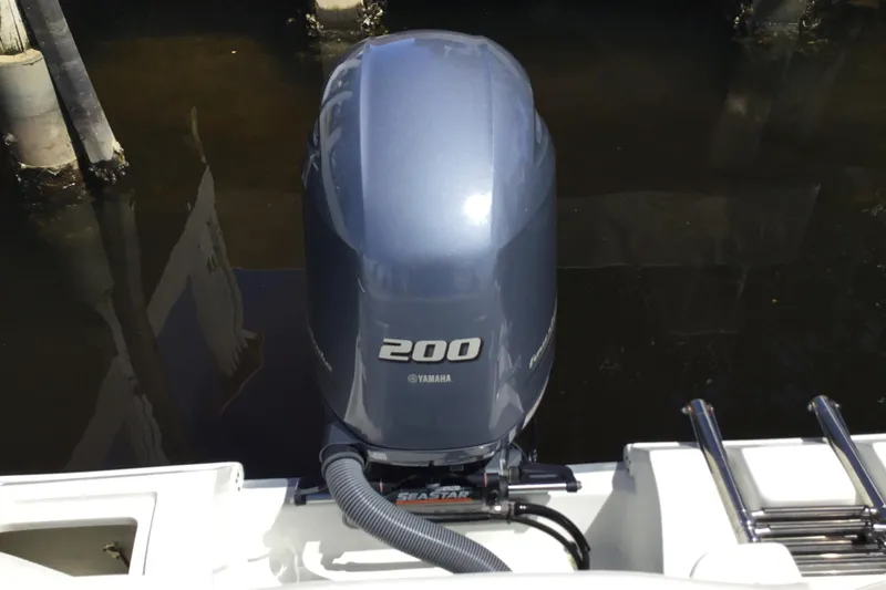 Slide: The Image of Yamaha 200 outboard motor on a 2020 Sea Hunt Ultra 225 boat. - 44