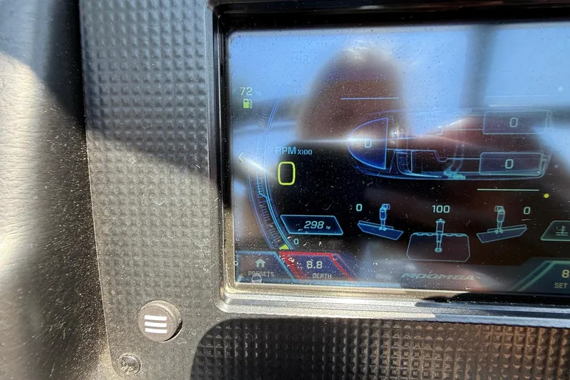 Slide: The Image of Dashboard display of a 2019 Moomba Makai boat showing RPM and depth readings. - 13