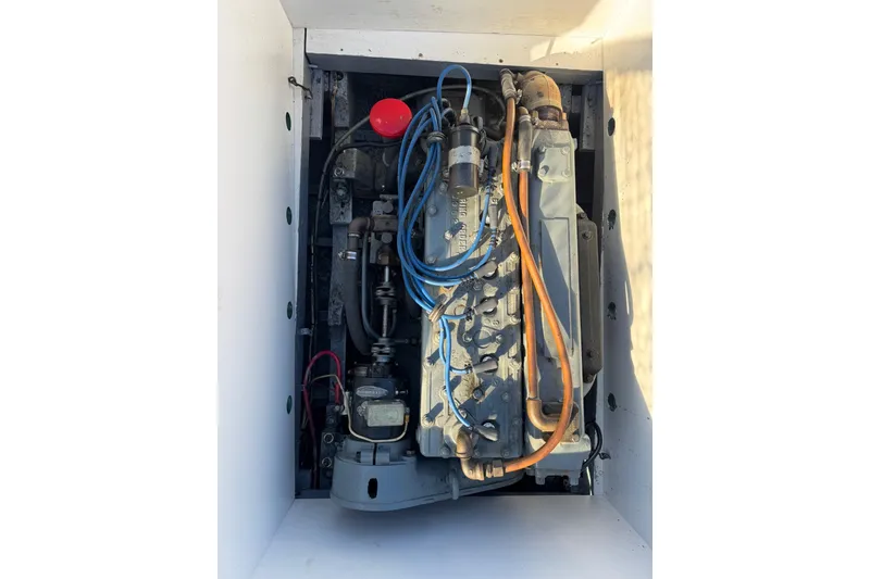 Slide: The Image of 1940 Chris-Craft Launch 25 engine compartment with visible wiring and components. - 14