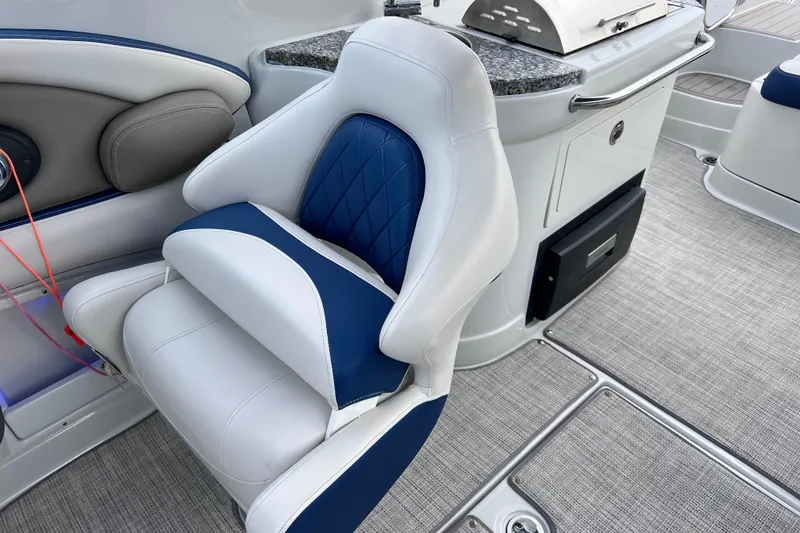 Slide: The Image of 2022 Crownline 290 XSS boat interior with luxurious seating and modern amenities. - 38
