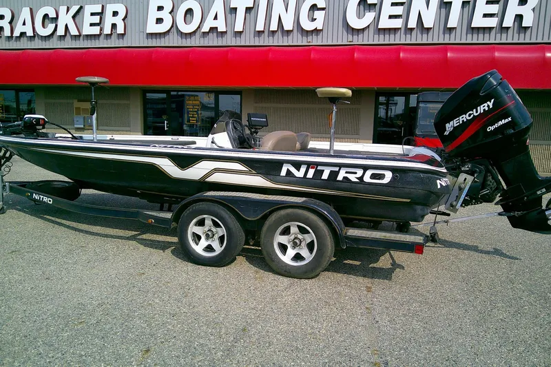 Slide: The Image of 1997 Nitro Savage 896 boat with Mercury engine at Tracker Boating Center. - 2