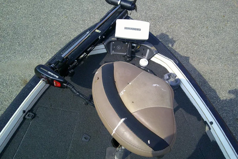 Slide: The Image of Front deck of 1997 Nitro Savage 896 boat with Humminbird fish finder. - 9