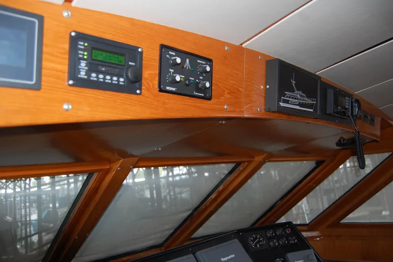 Slide: The Image of Interior view of 1990 Ocean Alexander 520 Pilothouse with navigation instruments. - 27
