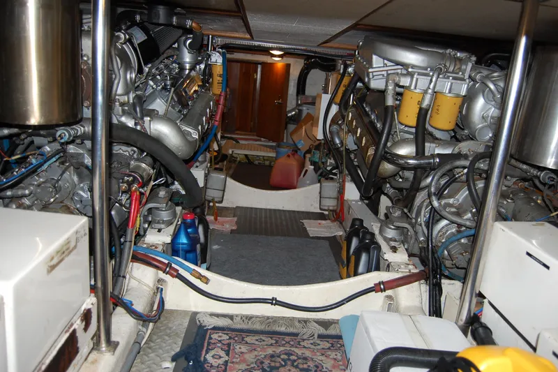Slide: The Image of Engine room of 1990 Ocean Alexander 520 Pilothouse with visible machinery and equipment. - 50