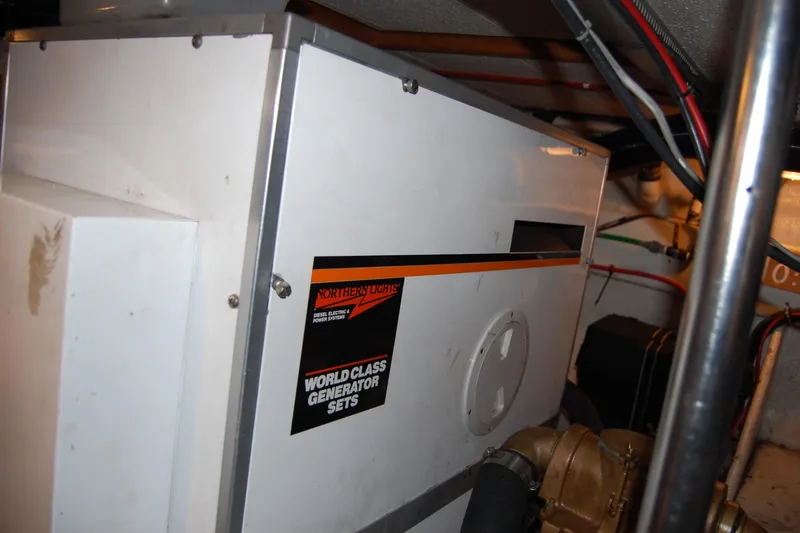 Slide: The Image of Engine room of 1990 Ocean Alexander 520 Pilothouse with Northern Lights generator. - 53