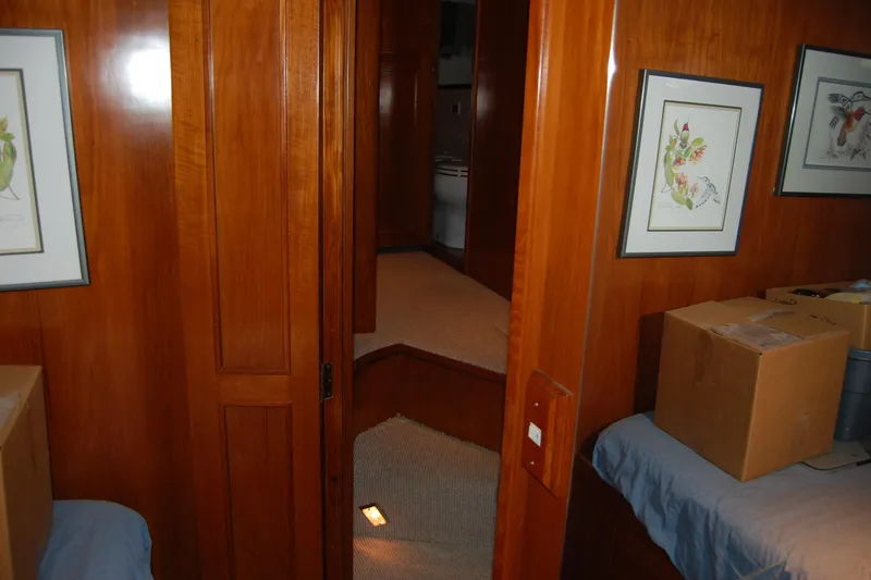 Slide: The Image of Interior of 1990 Ocean Alexander 520 Pilothouse with wood paneling and framed artwork. - 54