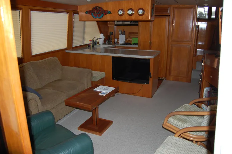 Slide: The Image of Luxurious 1990 Ocean Alexander 520 Pilothouse interior with cozy seating and modern amenities. - 60