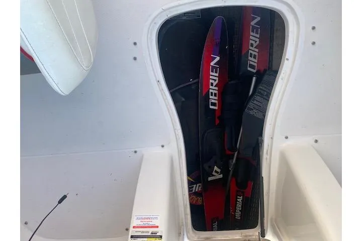 Slide: The Image of Storage compartment on 2012 Rinker Captiva 216 BR with O'Brien water skis. - 4