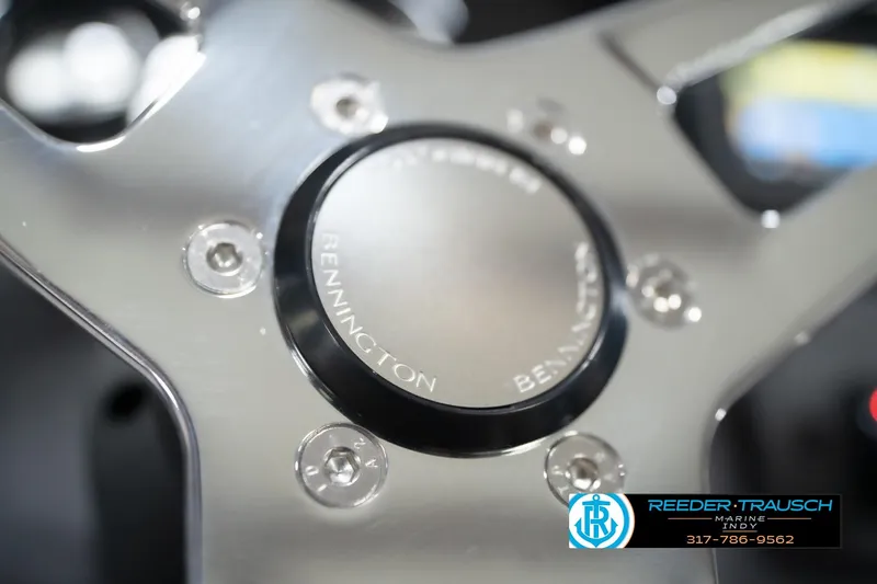 Slide: The Image of Close-up of 2026 Bennington 20 SL steering wheel with Reeder-Trausch Marine logo. - 35