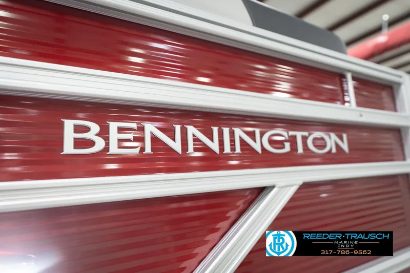 Slide: The Image of 2026 Bennington 20 SL boat with red exterior and branding details. - 56