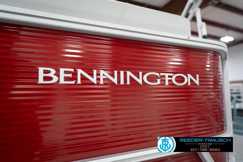 Slide: The Image of 2026 Bennington 20 SL boat with red exterior, showcased at Reeder-Trausch Marine. - 58