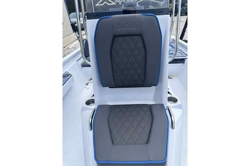 Slide: The Image of 2026 Xpress H22 boat seat with diamond-stitched gray upholstery and blue accents. - 10